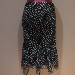 Cato Black Midi Skirt with Cream Burst Dot Pattern